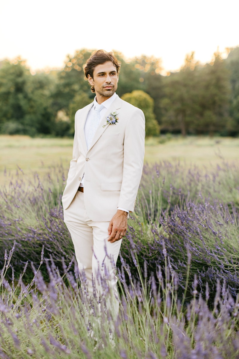 groom in tan suit