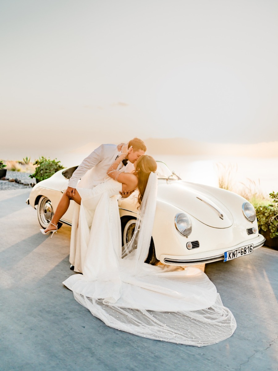 Pearl gloves and vintage cars bookended this luxe Santorini wedding