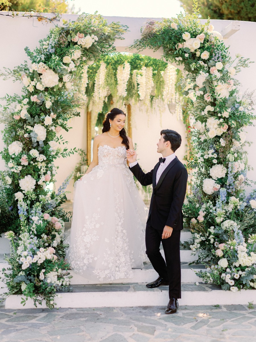 Hundreds of candles lit the walkway to this Athenian Riviera wedding